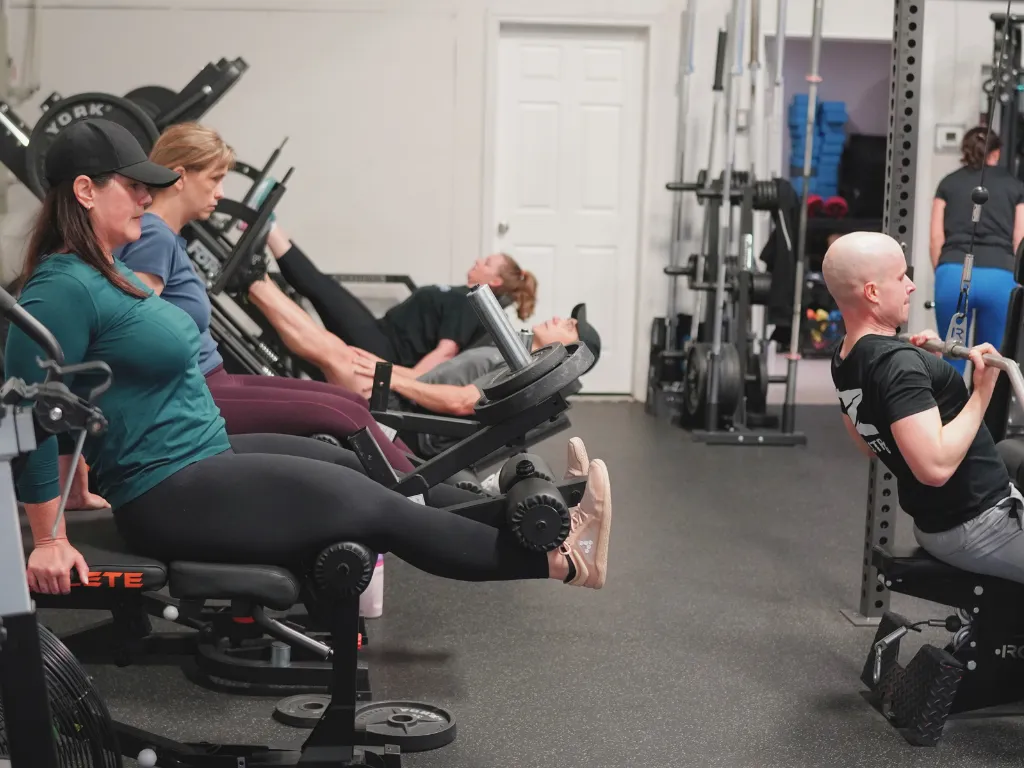 Define muscle building and body composition training at Move Strong in Kitchener-Waterloo