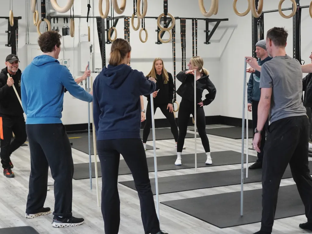 Members smiling and training together at Move Strong