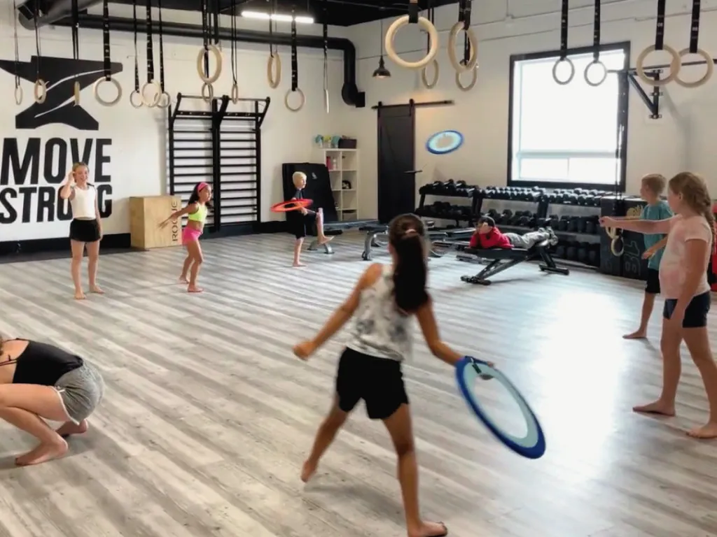 Coach teaching a Youth Mentorship session at Move Strong